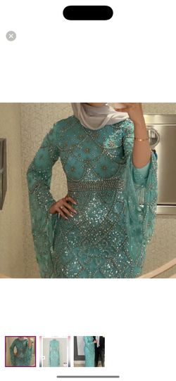 Fully beaded gown with cape sleeves 