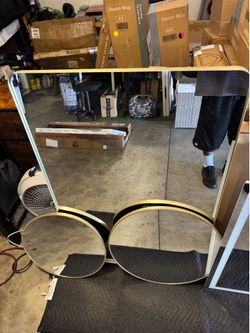 New gold trim wall mirror set $120