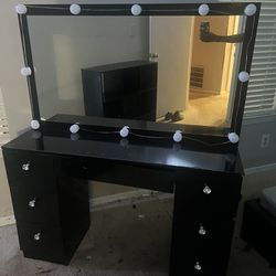 Black vanity dresser with lights