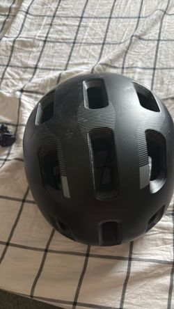 Two helmets one kids new and other one adults one time used together both only