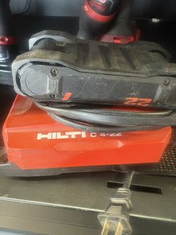 HILTI BATTERY AND CHARGER