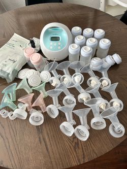 Spectra breast pump + extra parts