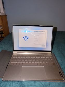 Lenovo Yoga 9i 14” OLED Premium 2-in-1 Convertible Laptop in excellent condition.
