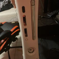 xbox 360 with games and controller