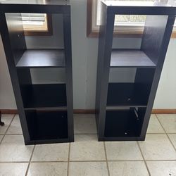 black cube shelves ]with three cubbies