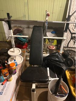 Sorry for the mess selling weights and weight  bench