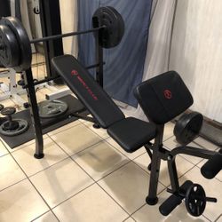 Gym Equipment Adjustable Bench press, barbell, leg developer and 100lbs of weight