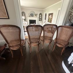 4 French Louis XV | French Provincial cane-back dining chairs. Solid wood frame Set of 4 French Louis XV / French Provincial cane-back dining chairs.
