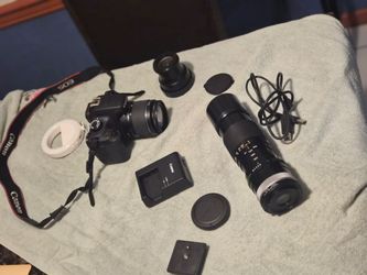 Eos Rebel t100 cama bundle and 100 400af adapter  with len call for more info like new(contact info removed)