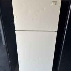 White Whirlpool Refrigerator And Freezer