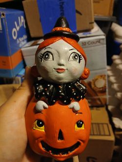 Vintage-looking Halloween Witch in pumpkin