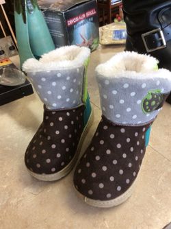 Slightly used size 1 boots