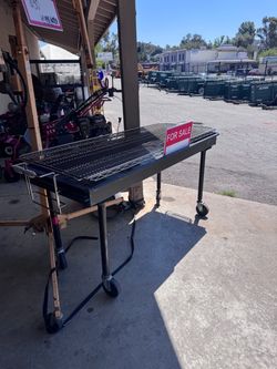 Portable charcoal grill