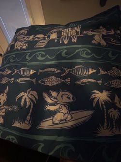 Disney Stitch couch pillows.   One large and one small.