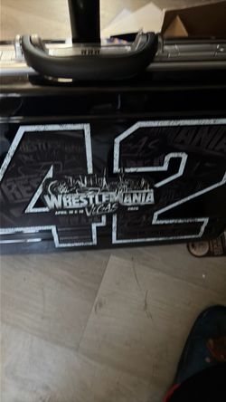 Get a  free wrestle mania briefcase when you buy over 3k