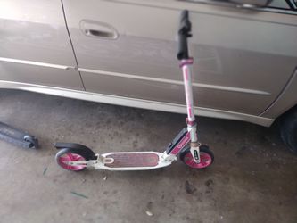 Girl pink scooter