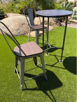 Pub style table and 2 chairs