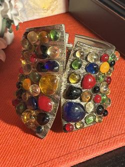 a unique and one-of-a-kind bracelet made by hand from hand-blown glass