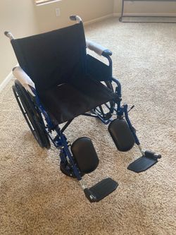 Wheelchair New with 18” seat and elevating leg and footrests