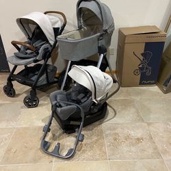 Nuna Mixx Stroller With Car Seat And Bassinet With Stand White Canopy
