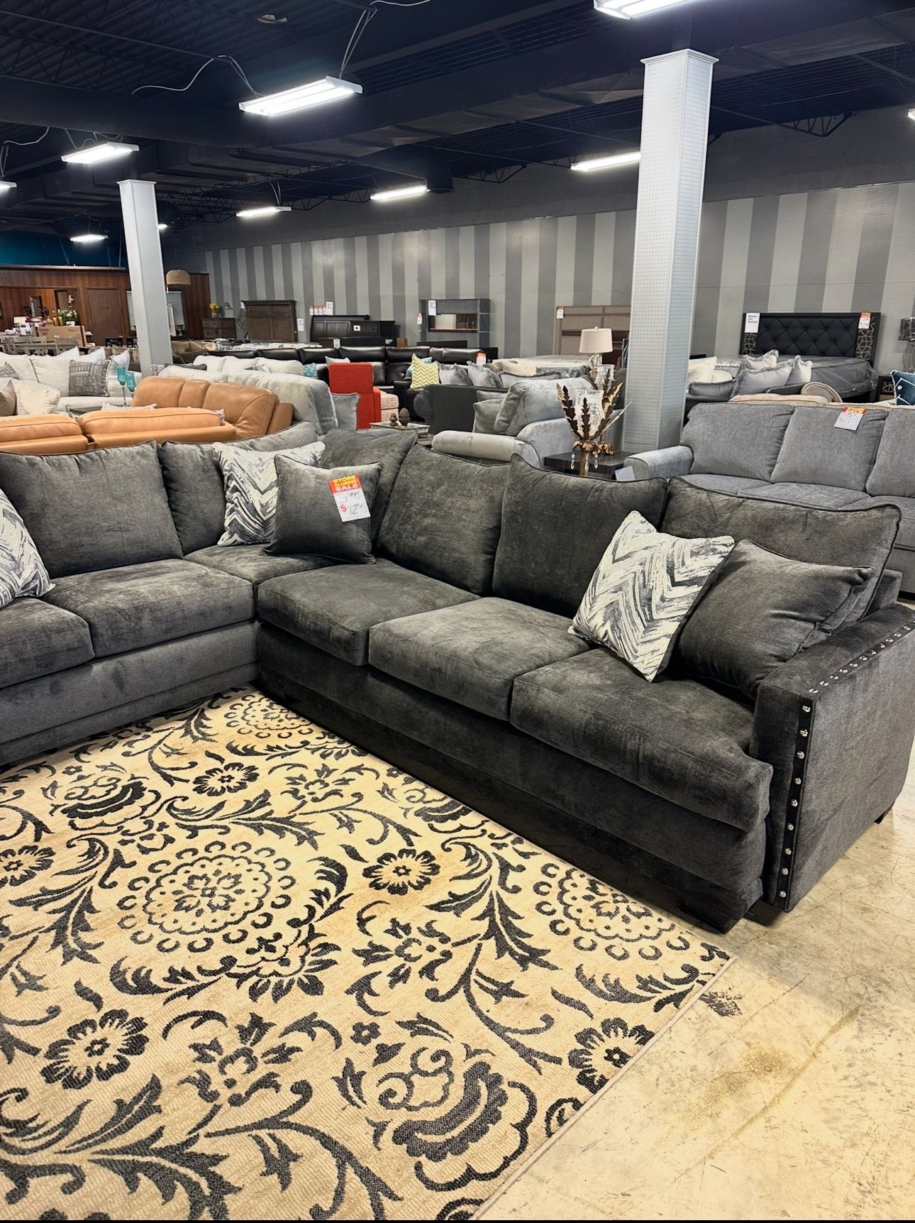 L shaped couch MUST GO
