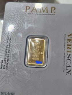 PAMP Suisse 2.5 gram gold bars sealed in tamper-evident assay packaging.