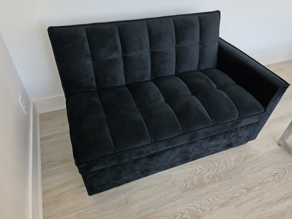 **Small black couch**