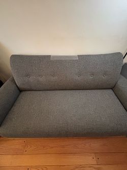Gently used gray love seat