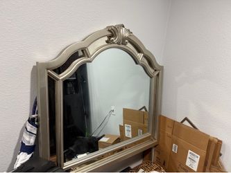 Bed frame mirror