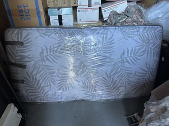 2 full bed mattresses and grey bed frames