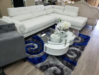 White sectional. Modern style. Financing available