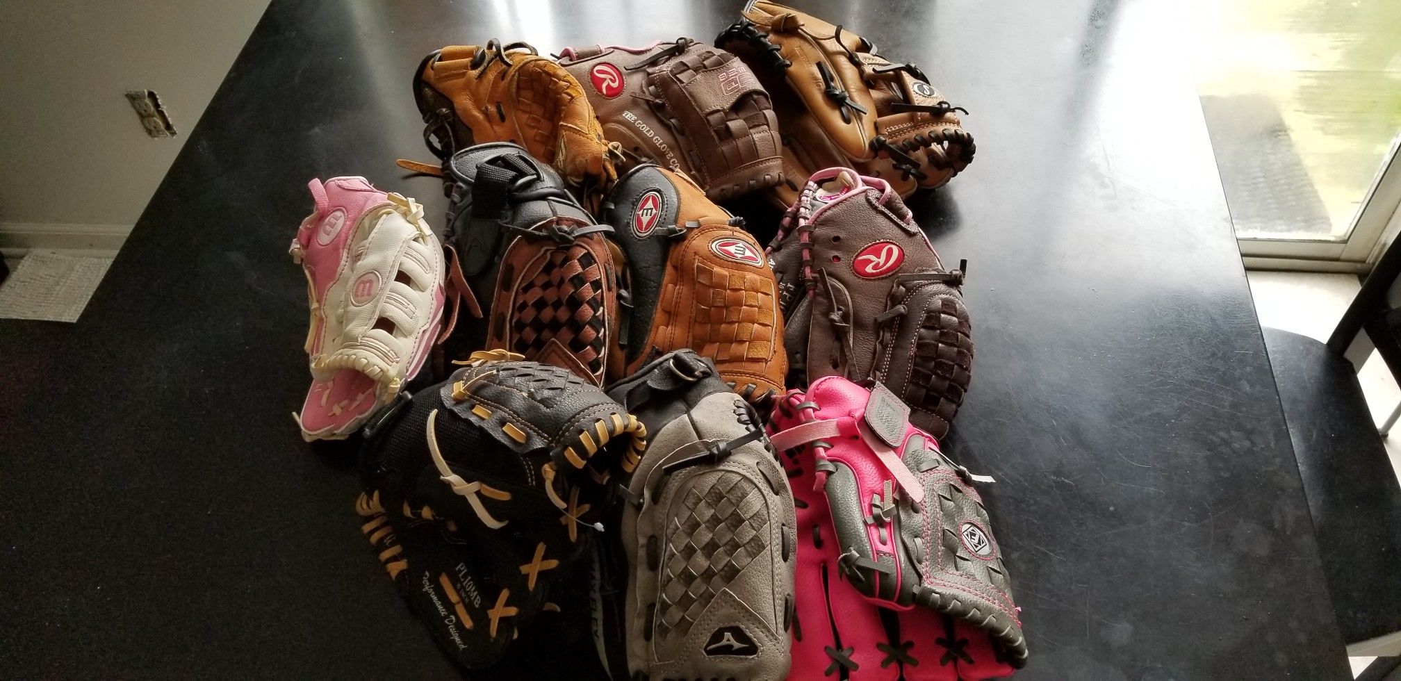 Lot of 10 right hand youth baseball gloves