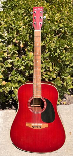 Carlo Robelli 6-string steel-string acoustic guitar