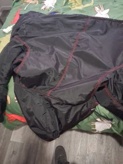 Supreme coat throw offer