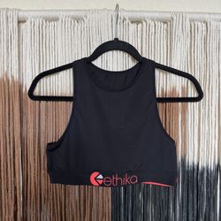 Black Ethika high neck performance style sports bra with neon pink accents