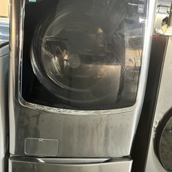 LG 5.2 Cu. Ft. Front Load Washer WM9000HVA With Pedestal And Warranty.