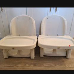 TWO booster Seat High Chairs 