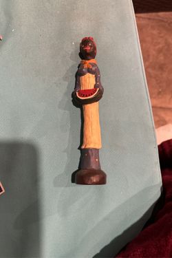 Wood carved mammy with watermelon