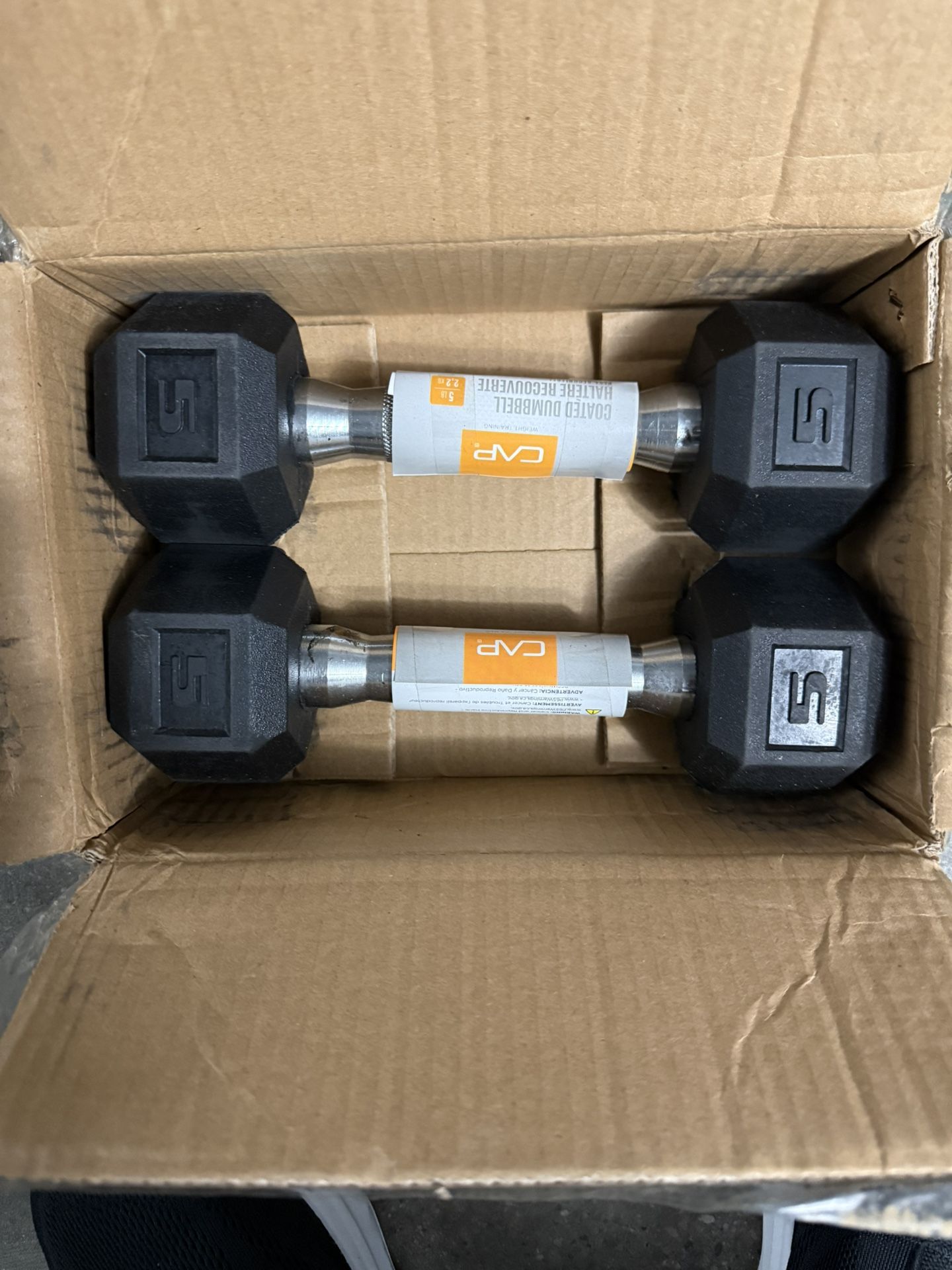 Brand new 5 Lb Dumbbells