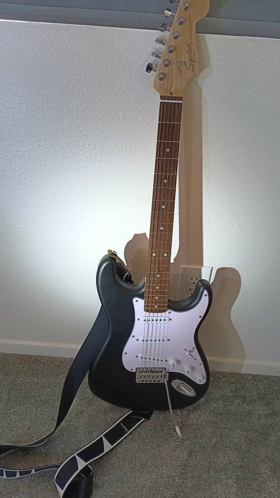 Black Squier Stratocaster Electric Guitar