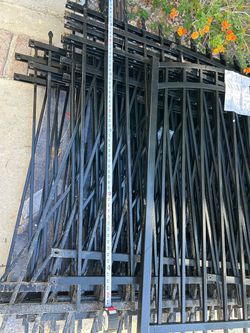 Black metal fence panels