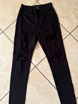 Women’s Black Ripped Skinny Jeans