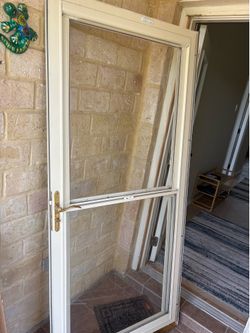 Storm door with screen 36