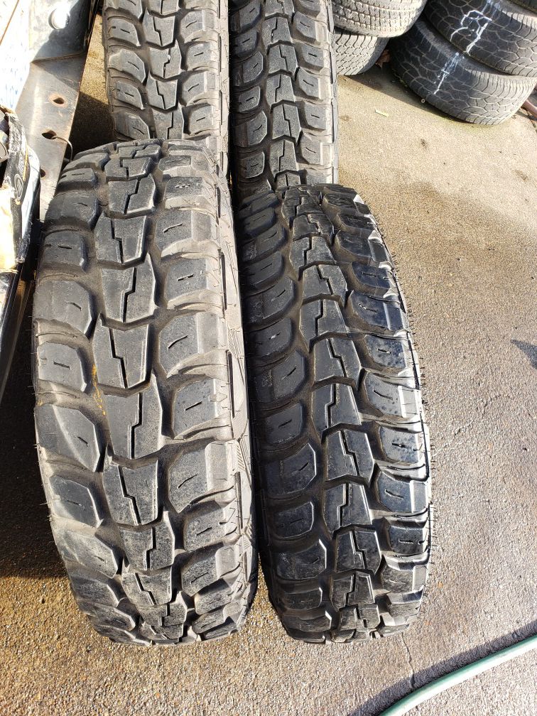 235 85 16 mud tires and 8lug wheels