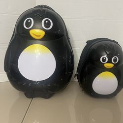 Travel Buddies Penguin Luggage Backpack Hardside Carry-On Rolling Luggage-2pc. Pre owned in good structural condition. Cosmetically, there are some no