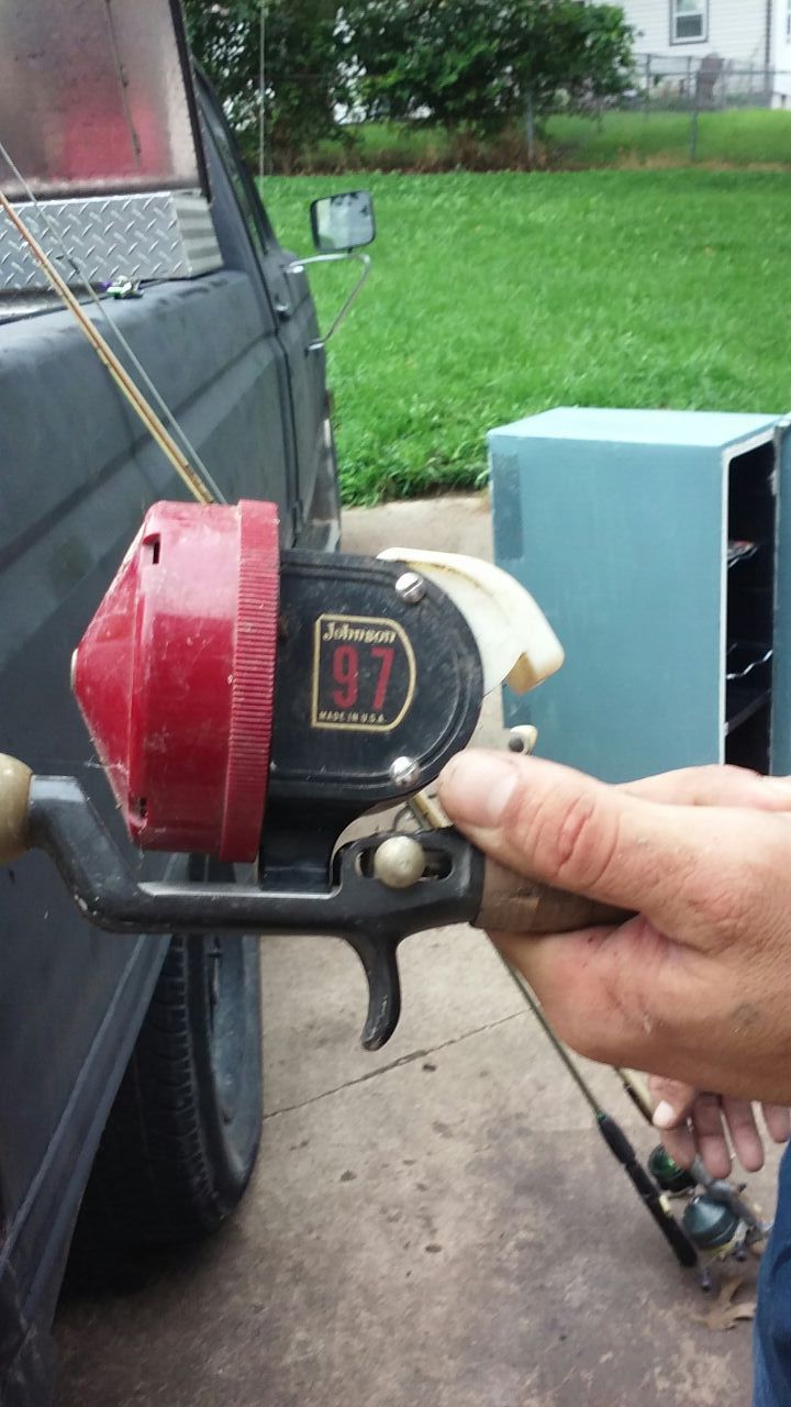 Rare rare rare....JOHNSON 97 Red fishing reel, and old metal pole. Most collectors has never seen one but here it is.