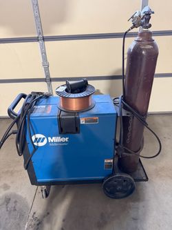 Miller millermatic 210 mig welder and tank