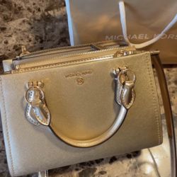 Michael Kors 'Ava' extra-small leather crossbody in a pale gold 