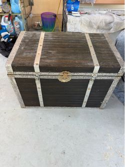 vintage or antique flat-top steamer trunk