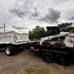 Sterling Dump Truck And Bobcat 